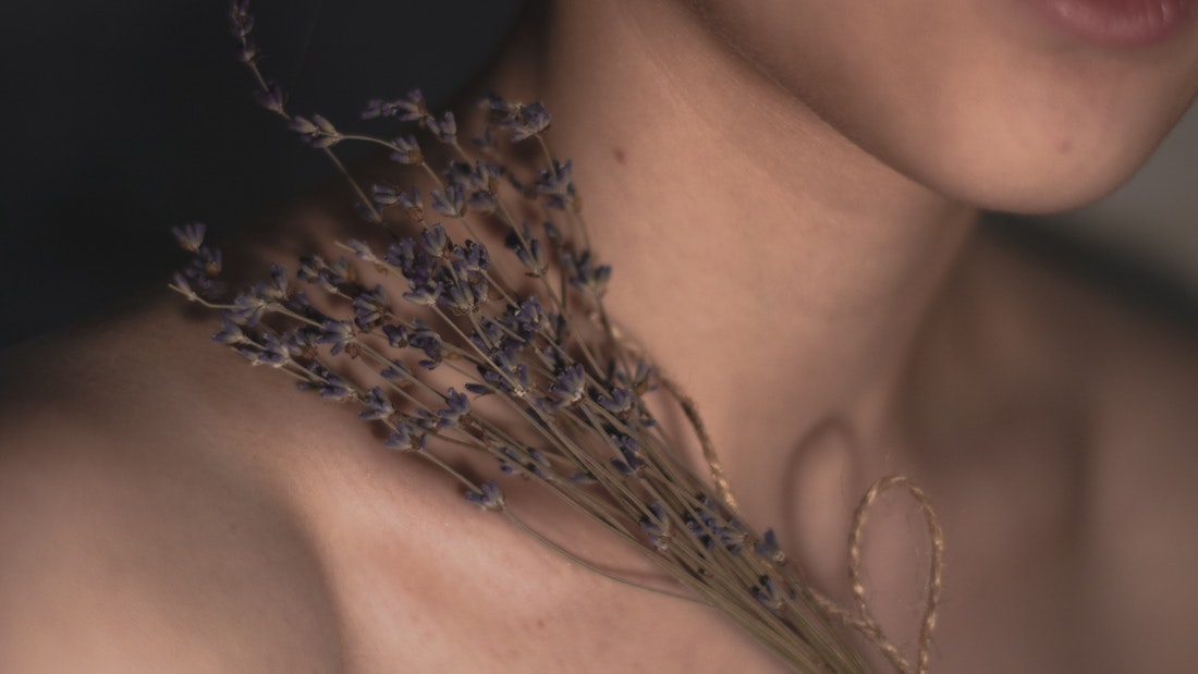lavender on a woman's shoulder